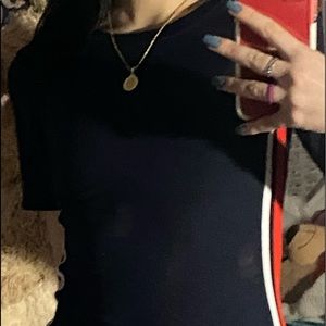 Striped blue ribknit bodycon dress with white and red taping down the side.